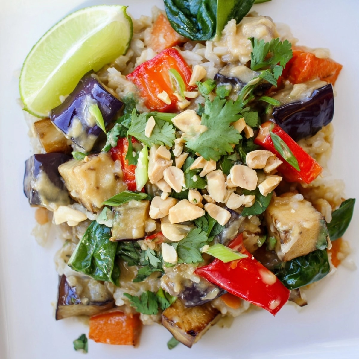 Golden Thai Peanut Eggplant Rice Bake bubbling hot, ready for a flavorful vegetarian dinner.