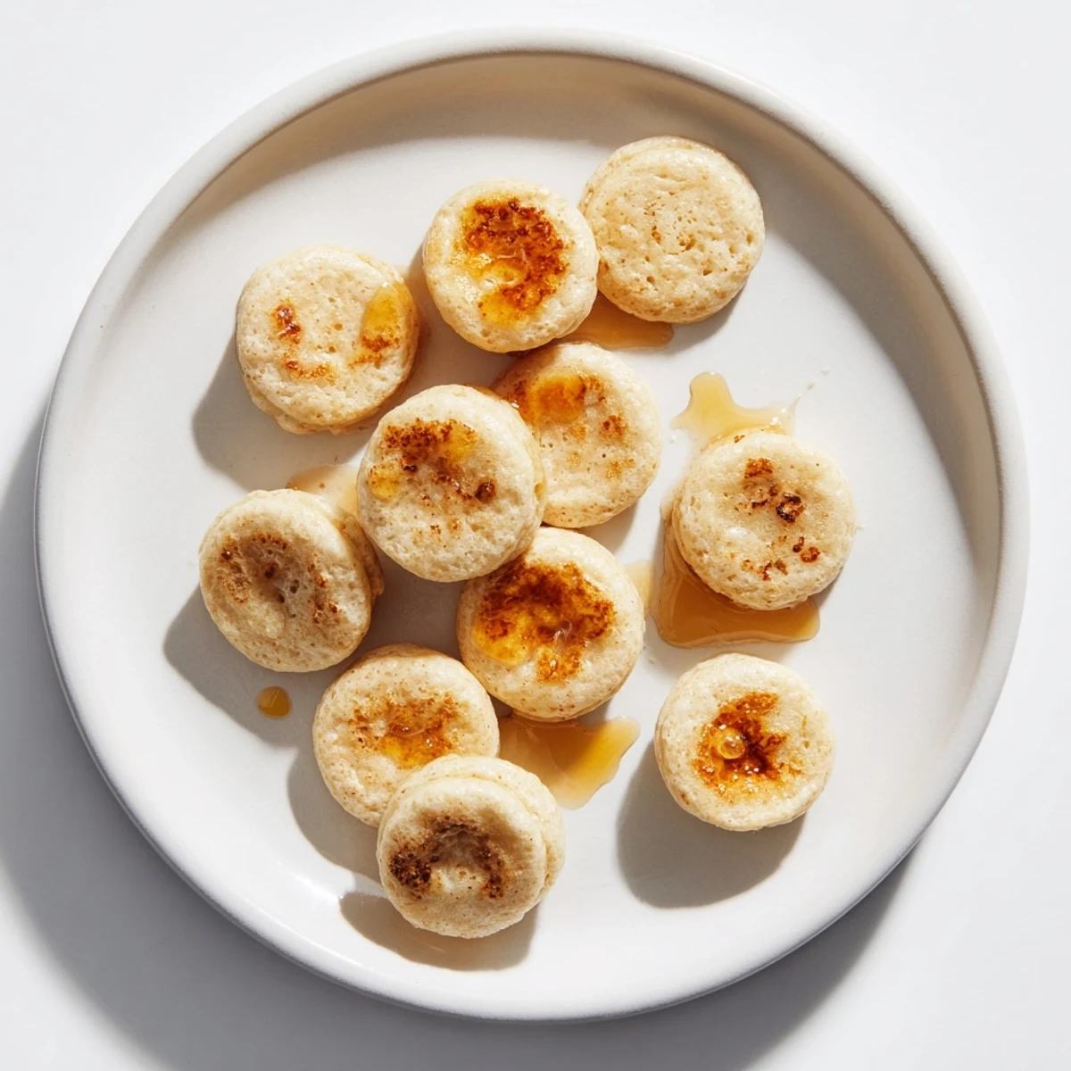 Enjoy the playful texture of pancake cereal, a trendy breakfast with a sweet, golden appearance.