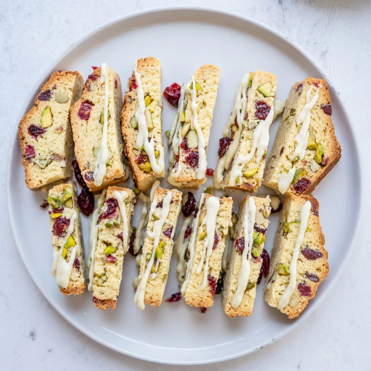 Golden-brown White Chocolate Cranberry Pistachio Biscotti, perfect for sharing with coffee and friends.