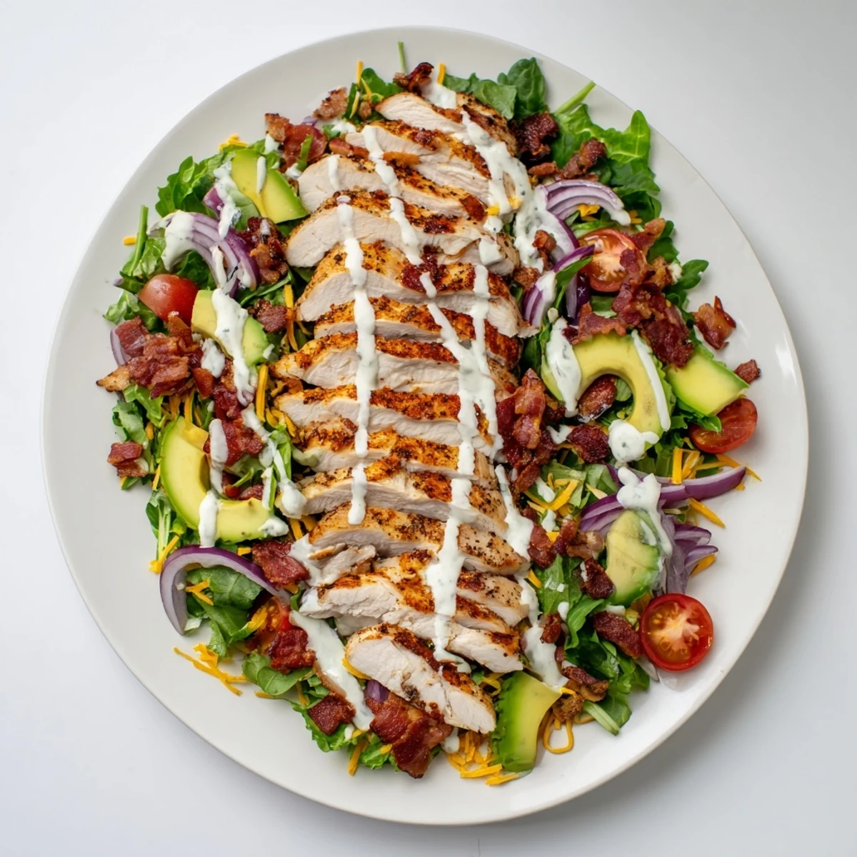 Crispy Bacon Chicken Salad with juicy chicken, crunchy bacon, and fresh mixed greens, drizzled with creamy ranch.