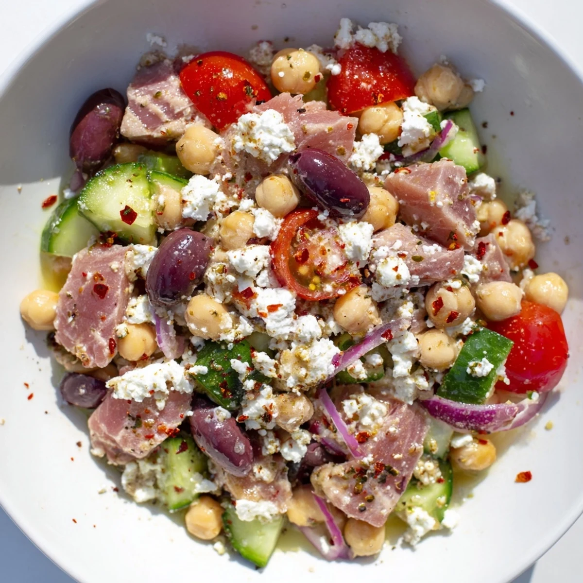 This healthy Tuna Chickpea Salad is a delicious combination of protein and veggies, perfect for lunch.