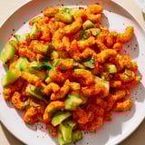 This Flamin Hot Cheeto Salad showcases colorful ingredients and a zesty lime dressing, ready to eat.