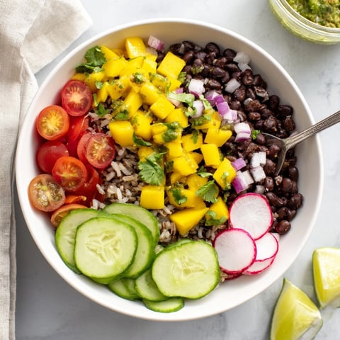 Bright and colorful Mango Salsa Black Bean Bowls, a taste of summer in every bite.