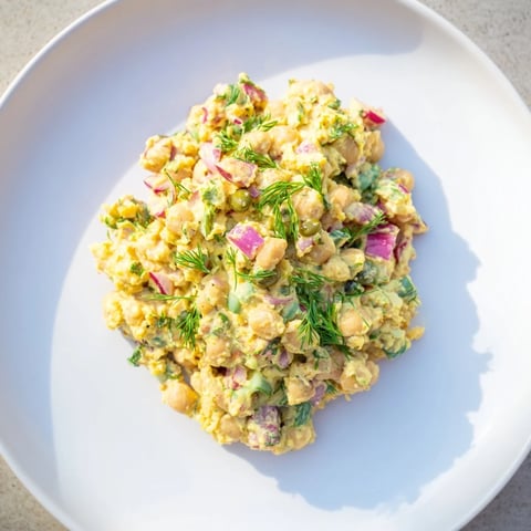 Creamy chickpea tuna salad, a vegan delight with seaweed flakes and crunchy vegetables, ready to serve.