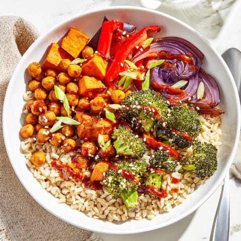 Colorful grain bowls with creamy miso-butter and spicy gochujang sauces for flavor.  