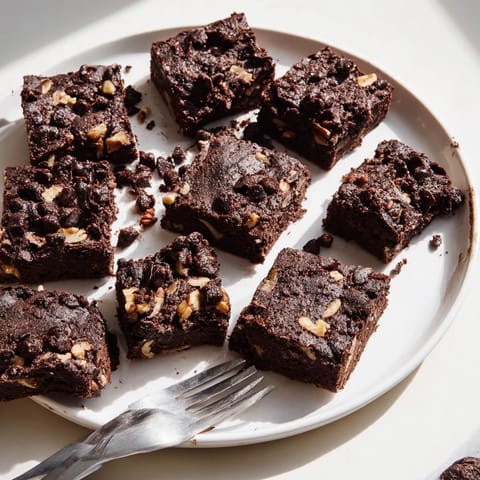 Decadent fudge brownies featuring nut-milk pulp for a guilt-free dessert.  